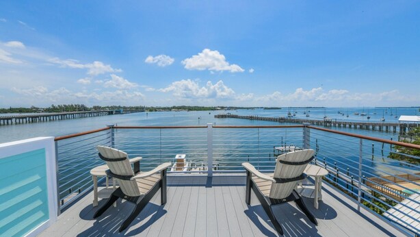 House, 5 Bedrooms | Balcony - Bayfront Retreat by AMI Locals (Bradenton Beach)