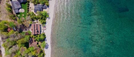 On the beach, sun loungers