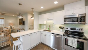 Casa, 4 habitaciones | Cocina privada | Refrigerador, microondas, parrilla de estufa y lavavajillas 