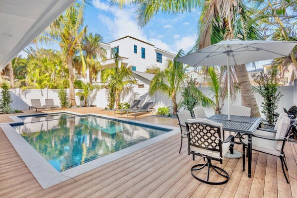 Outdoor pool, open 8:00 AM to 8:00 PM, pool umbrellas, pool loungers