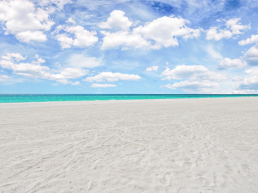Private beach, white sand, sun loungers, beach umbrellas