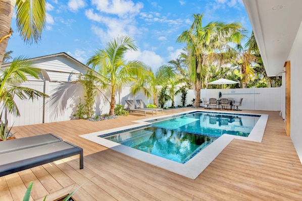Outdoor pool, open 8:00 AM to 8:00 PM, pool umbrellas, pool loungers