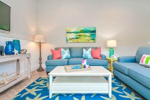 Living room - Caribbean Reef by AMI Locals (Holmes Beach)