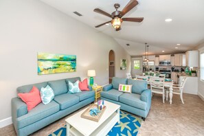 Living room - Caribbean Reef by AMI Locals (Holmes Beach)