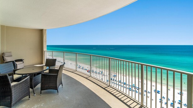 A balcony with a view of the beach and ocean. - Ocean Villa 1302 (Panama City Beach)
