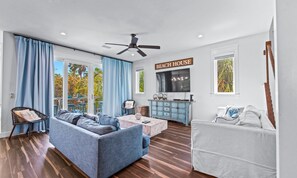 House, Multiple Beds | Living room | 42-inch flat-screen TV with cable channels, TV - Crystal Waves Oasis by AMI Locals (Bradenton Beach)