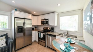 House, 3 Bedrooms | Private kitchen - Coconut Cottage #1 by AMI Locals (Holmes Beach)