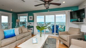 House, 5 Bedrooms | Living room | 36-inch TV with digital channels - Gulf View Beach House by AMI Locals (Bradenton Beach)
