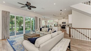 House, 4 Bedrooms | Living room | 42-inch TV with cable channels - Island Pearl Oasis by AMI Locals (Holmes Beach)