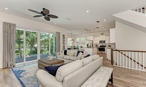 House, 4 Bedrooms | Living room | 42-inch TV with cable channels - Island Pearl Oasis by AMI Locals (Holmes Beach)