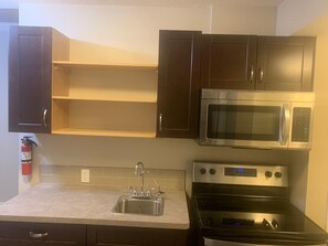 Fridge, microwave, oven, stovetop - Cove On A Hill - Entire (2Bdrm & Full Bath) Basement Suite (Calgary)