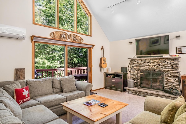 Our signature fieldstone fireplace in our huge great room.