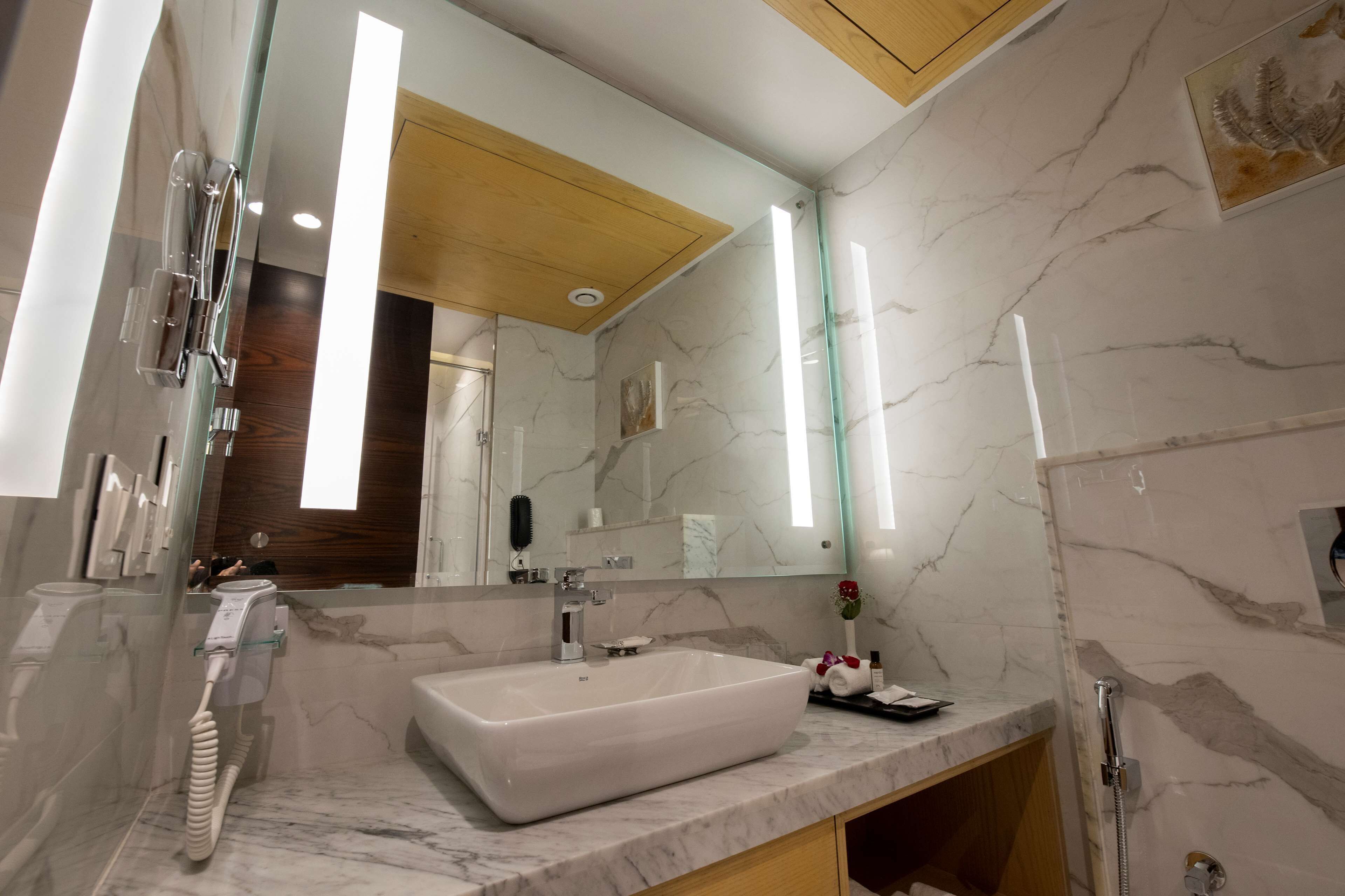 shower, rainfall showerhead, hair dryer, slippers