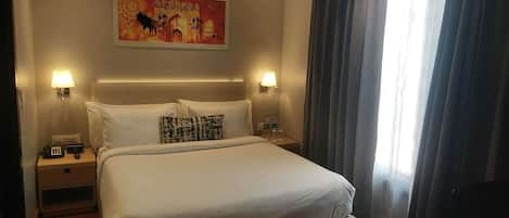 Minibar, in-room safe, desk, laptop workspace