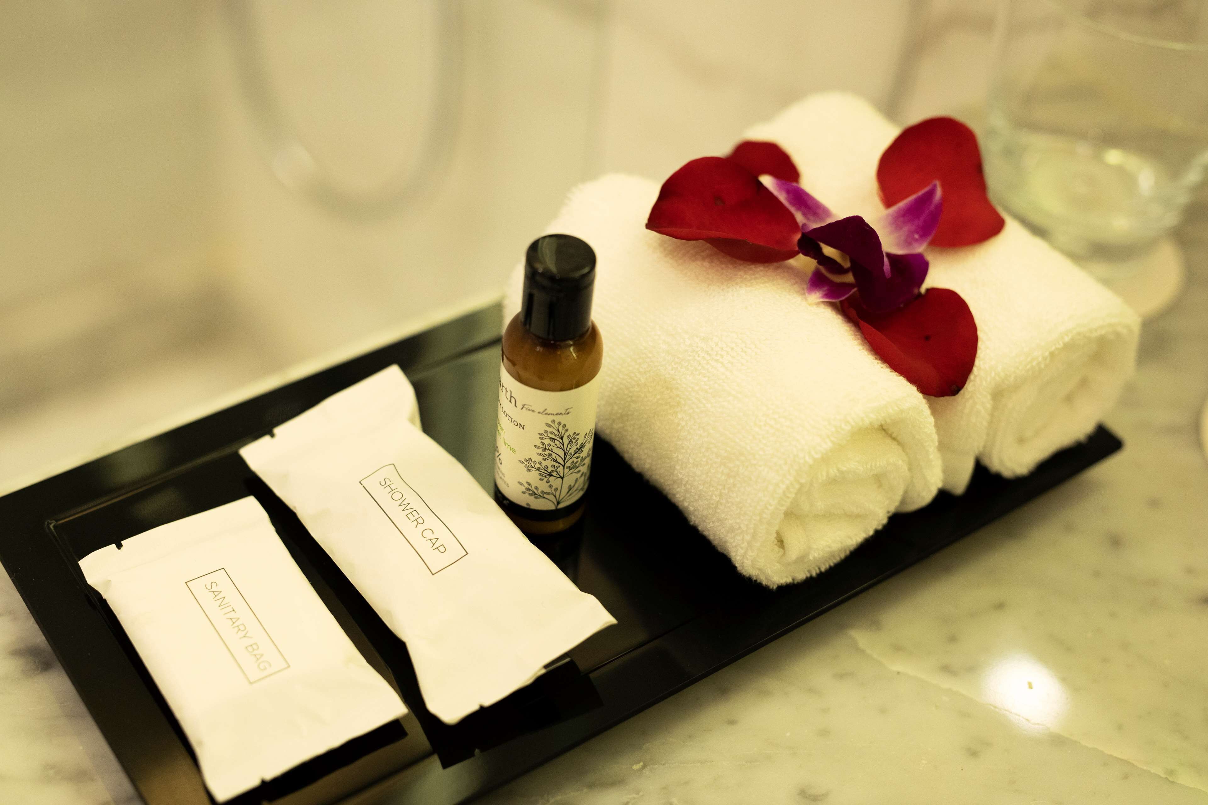 shower, rainfall showerhead, hair dryer, slippers