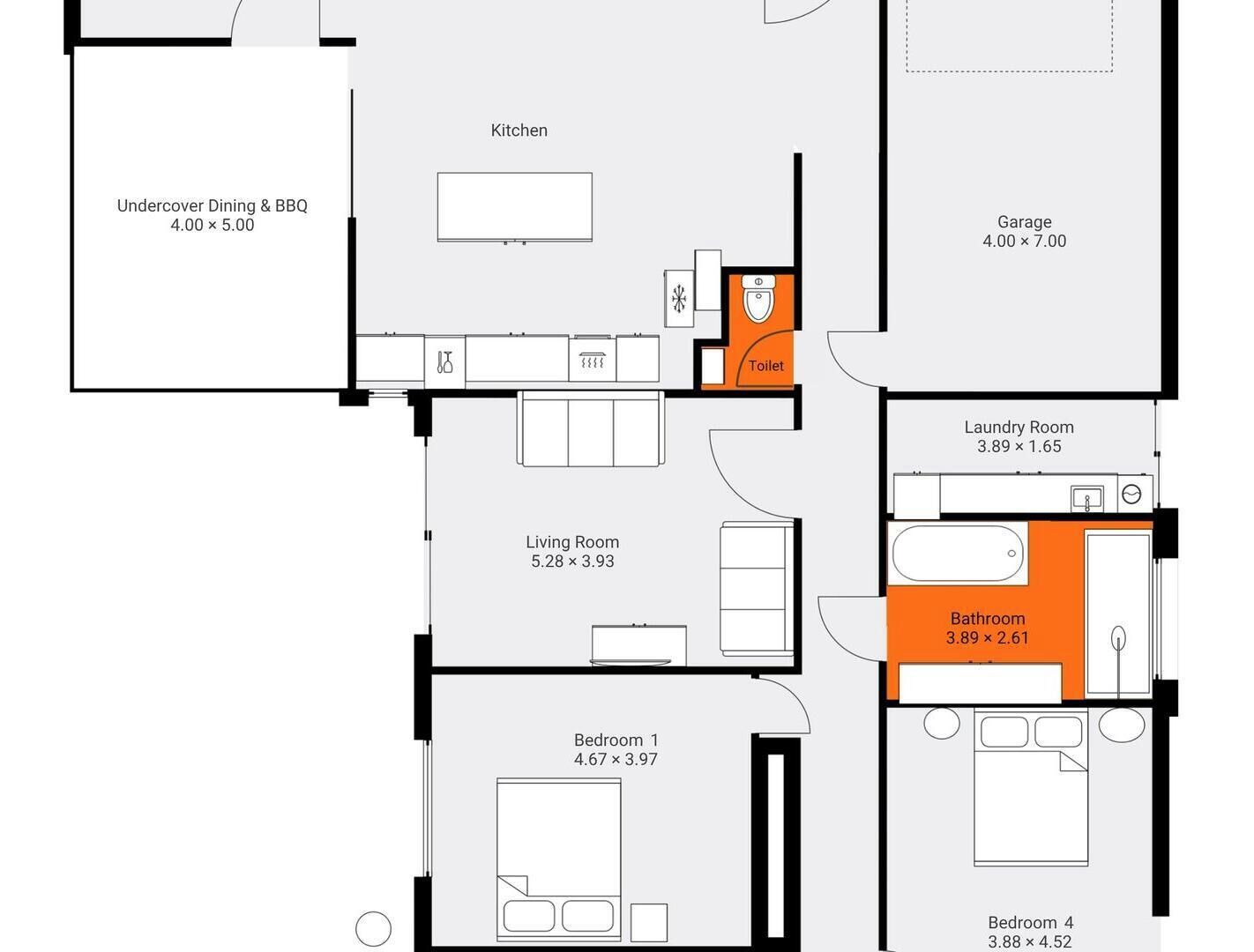 A floor plan with a kitchen, living room, two bedrooms, a bathroom, a laundry room, and a garage.