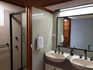 Bathtub, hair dryer, towels, soap
