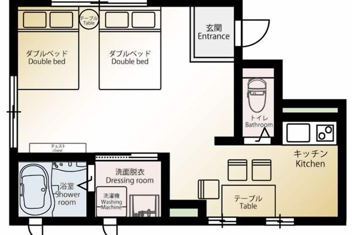 Grundriss eines Hotels mit zwei Doppelbetten, einem Badezimmer, einem Ankleidezimmer, einer Duschkabine, einer Waschmaschine und einer Küche.