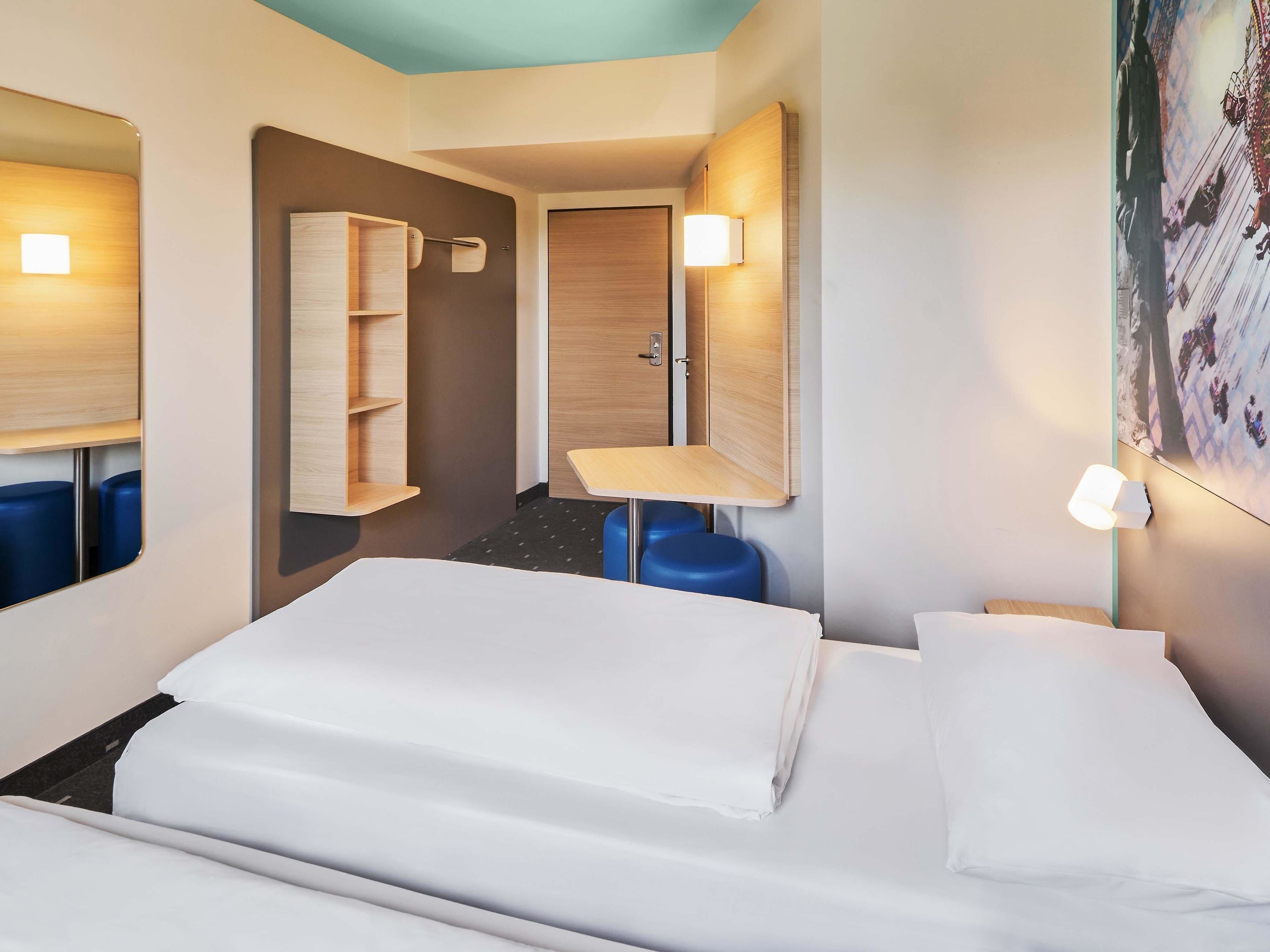 Habitación con 1 cama doble o 2 individuales | Escritorio, sistema de insonorización, wifi gratis y ropa de cama