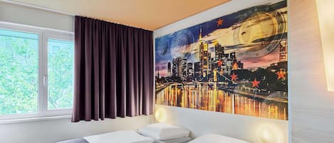 Hypoallergeen beddengoed, een bureau, geluiddichte muren, gratis wifi