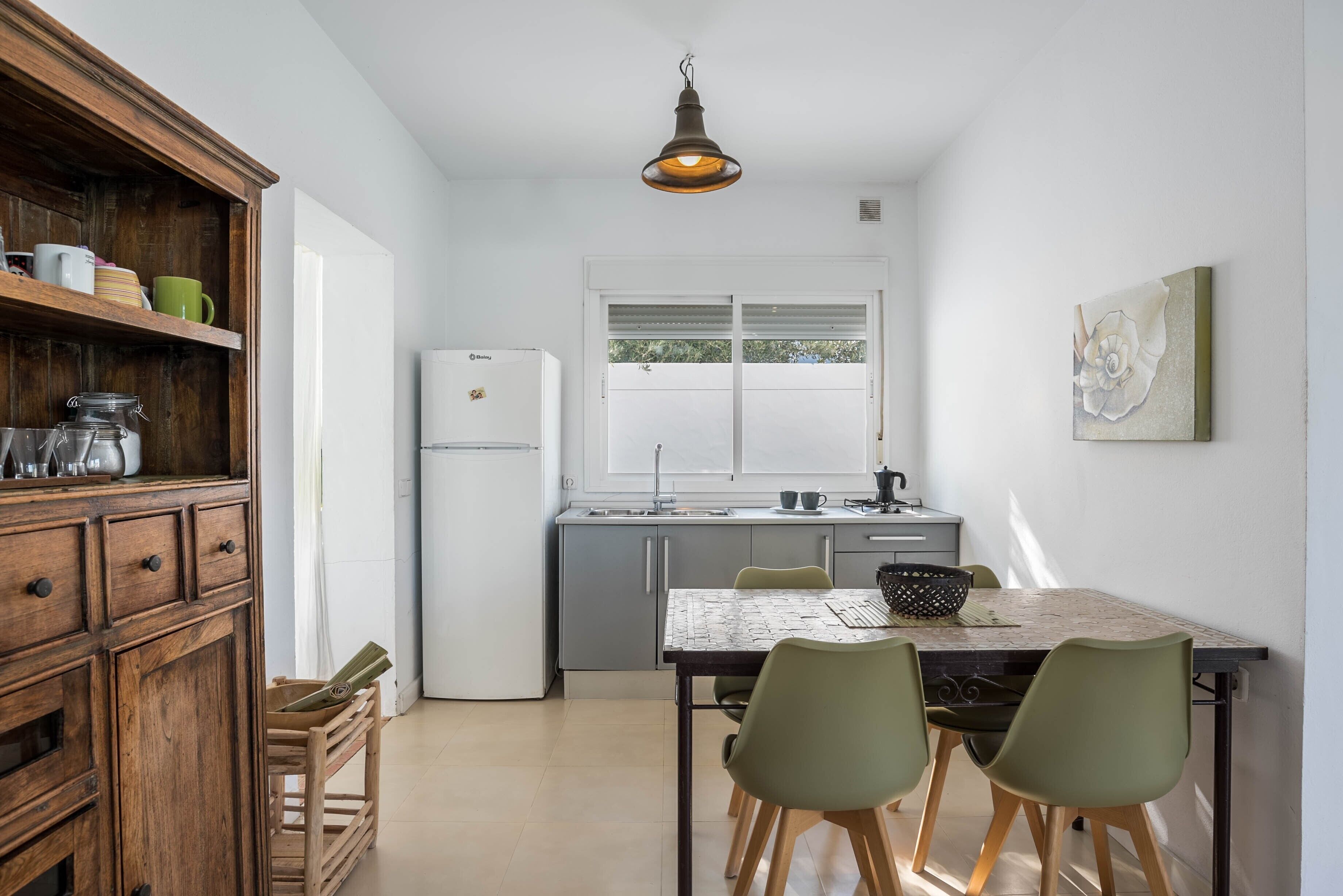 Fridge, stovetop, coffee/tea maker, cookware/dishes/utensils