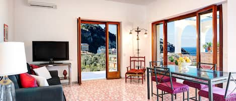 Apartment, 2 Bedrooms | Living area | Flat-screen TV