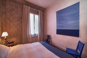 1 slaapkamer, een strijkplank/strijkijzer, wifi, beddengoed