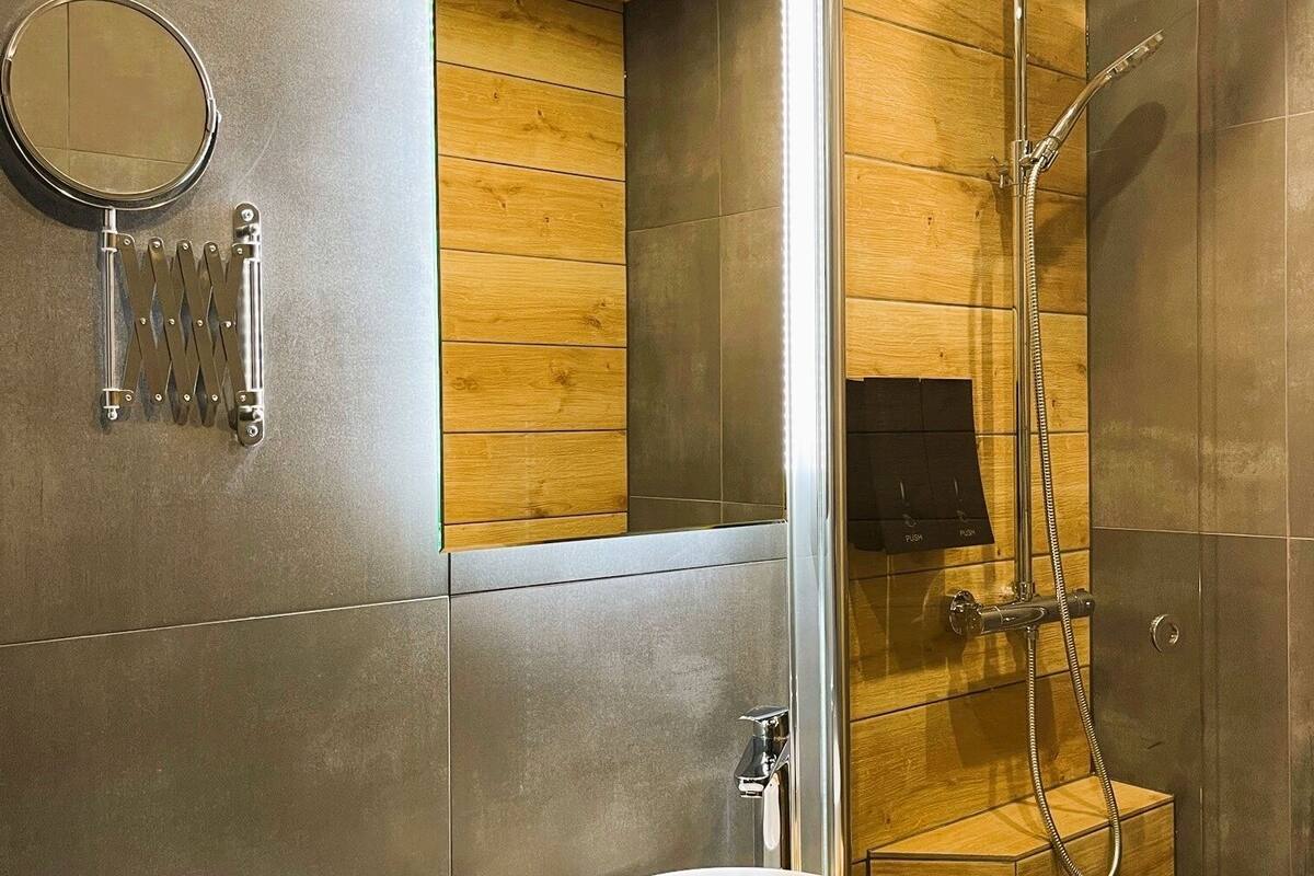 family room, balcony, park view | bathroom | shower, slippers, towels