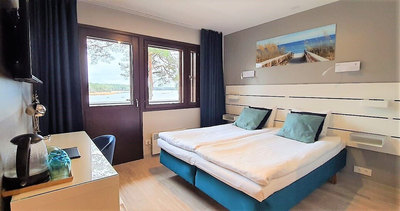 Chambre Panoramique Double ou avec lits jumeaux, balcon, vue mer | Espace de travail pour ordinateur portable, rideaux occultants