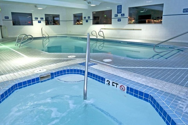 Indoor swimming pool and hot tub for your convenience