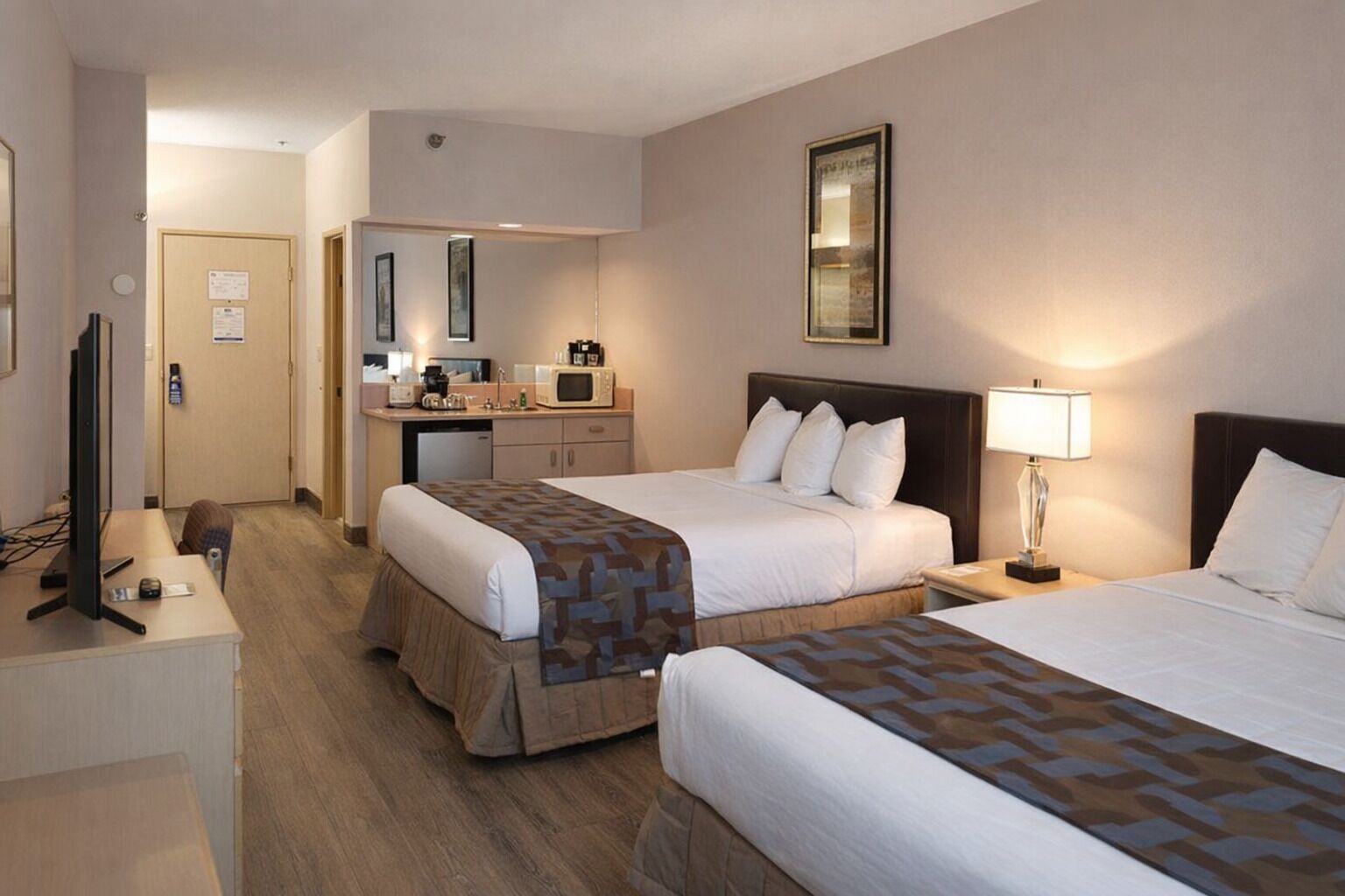 Settle in with cozy beds and easy snacks from the kitchenette.