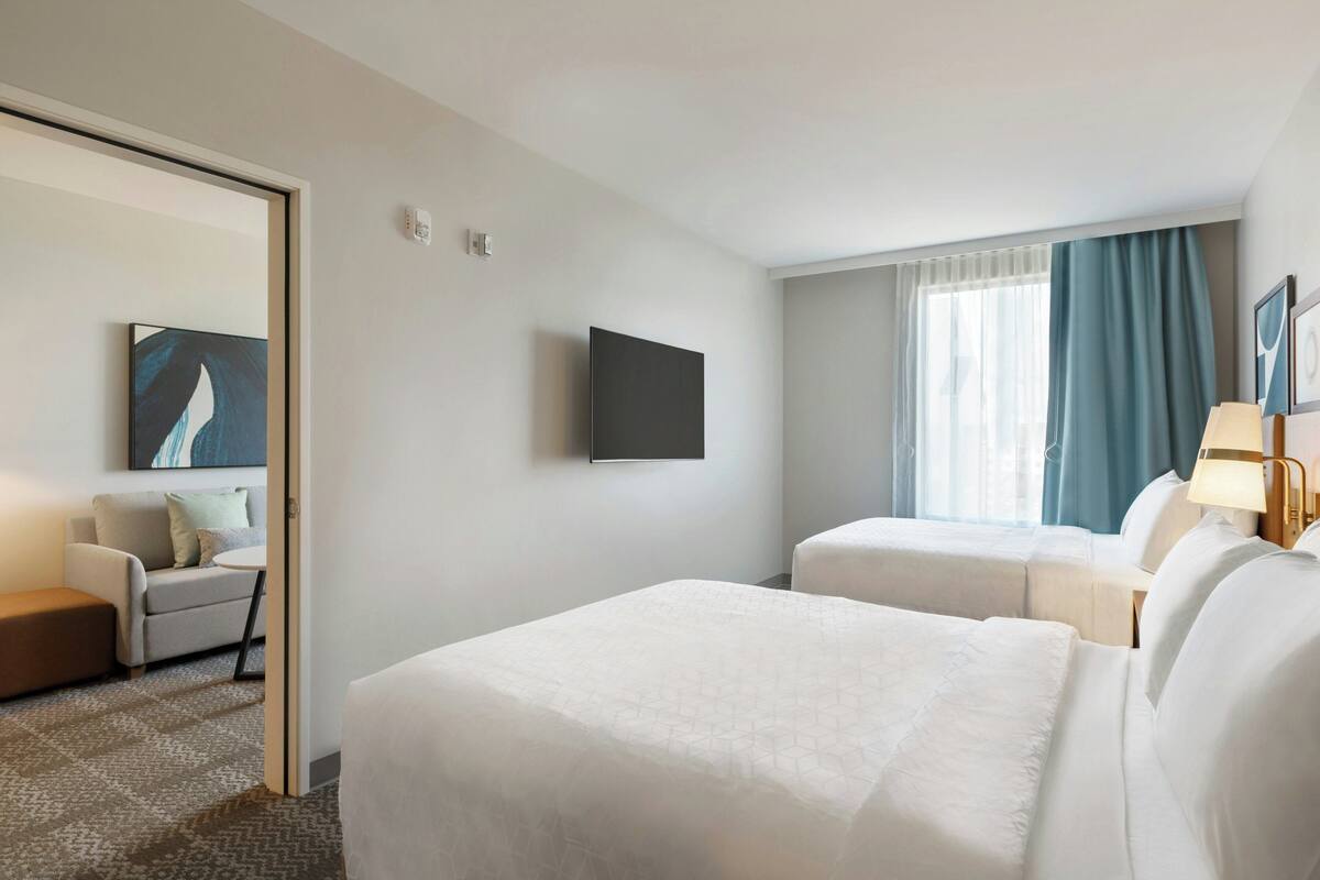 Premium bedding, pillow-top beds, in-room safe, desk