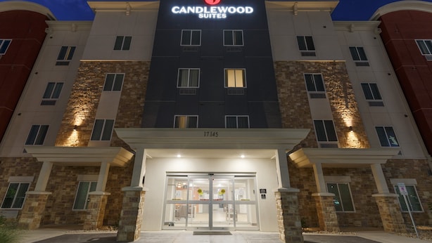 A hotel entrance with a sign reading "Candlewood Suites" and a number "17145" above the doors. - Candlewood Suites San Antonio Schertz by IHG (Schertz)