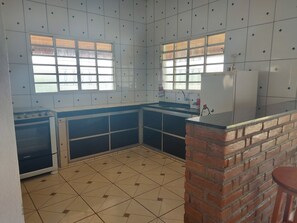 Fridge, stovetop, coffee/tea maker, cookware/dishes/utensils