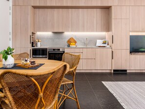 Fridge, microwave, oven, dishwasher - The Arden 1 Coogee. New Spacious Garden Apartment, Moments to Beach (Sydney)