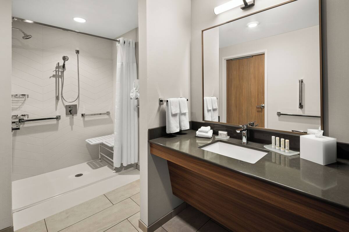 room, 2 queen beds (mobility accessible, roll-in shower) | 1 bedroom, in-room safe, desk, laptop workspace