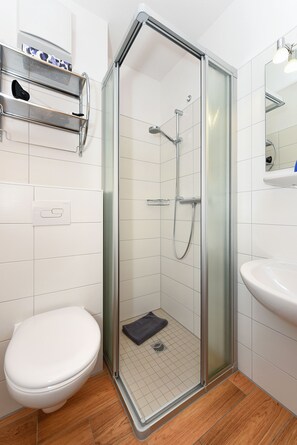 Een douche, een haardroger, zeep