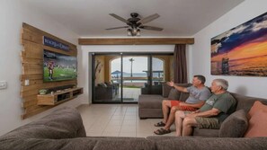 TV, music library, stereo - Ground Floor 1-Bedroom Beachfront at Princesa - Steps from Pool | BeachBumCondos (Puerto Peñasco)