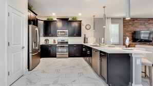 Microwave, oven, stovetop, dishwasher - You Have Found the Ultimate 8 Bedroom Villa on Champions Gate Resort, Orlando Villa 3711 (Davenport)