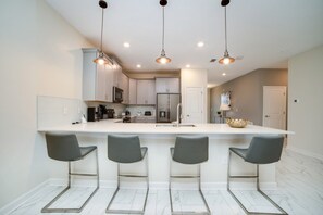 Microwave, oven, stovetop, dishwasher - The Secret to Enjoying Your Luxury Villa Holiday on Champions Gate Resort, Orlando Villa 3720 (Davenport)