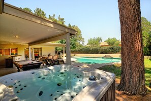 A backyard with a hot tub, pool, and covered patio area. - Just Listed! Kierland Home w Htd Pool and Hot tub (Scottsdale)