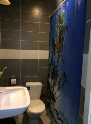 Bathroom - Yellow apartment- Pelka House , 2 bedroom . (Brusubi)