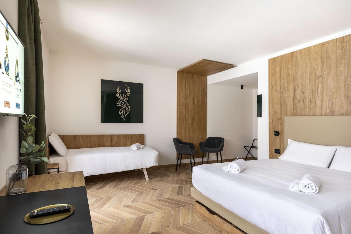 Chambre Quadruple Standard, non-fumeurs | Literie hypoallergénique, matelas mémoire de forme