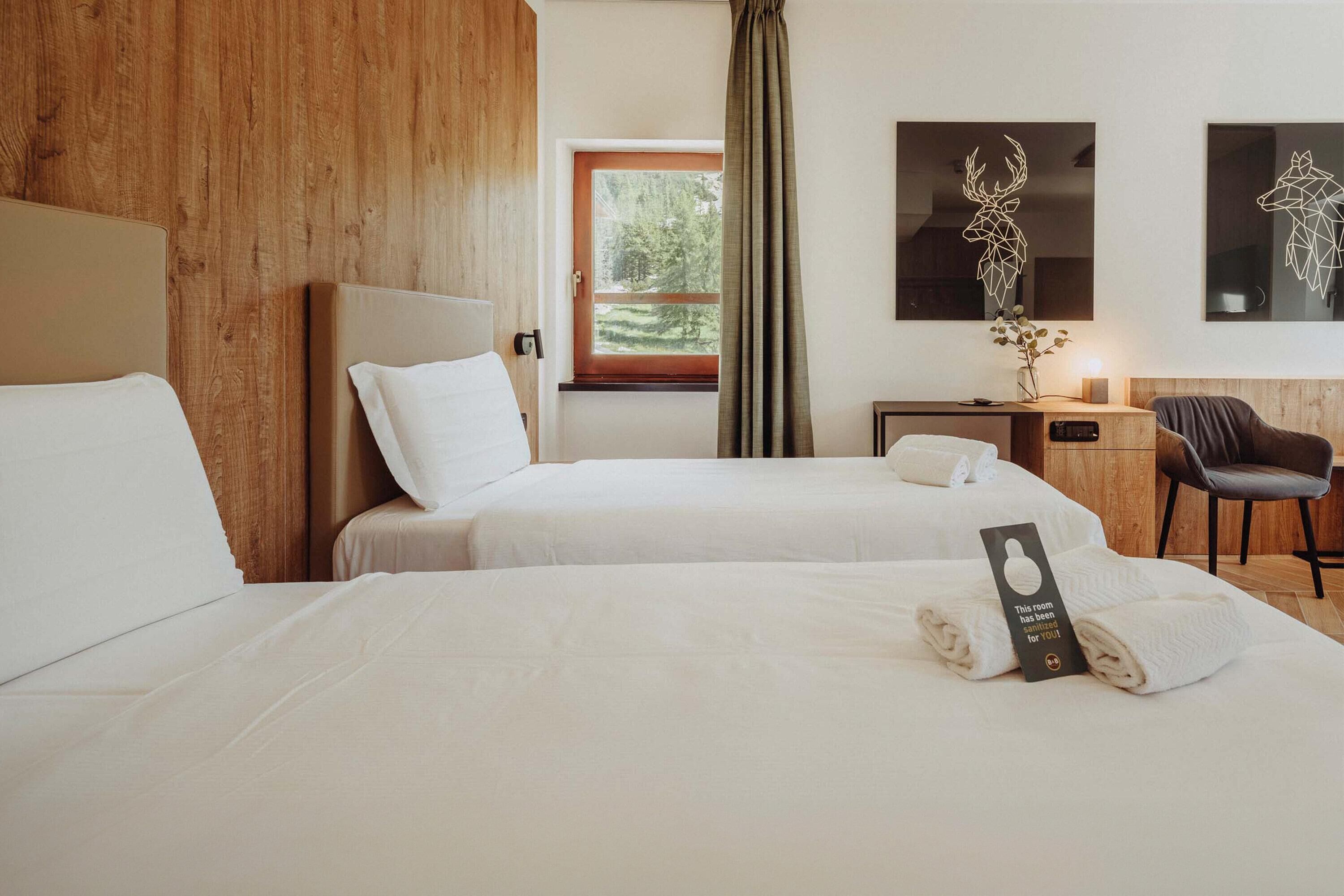 Hypo-allergenic bedding, memory-foam beds, in-room safe