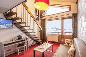 Suite, mezzanine | Wifi gratis y ropa de cama 