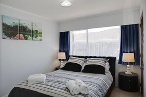4 bedrooms, iron/ironing board, travel cot, WiFi