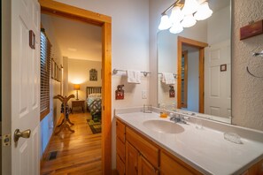 Combined shower/bathtub, hair dryer, towels, soap