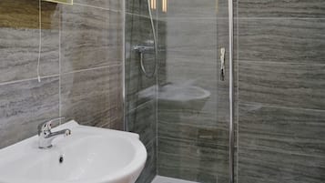 Combined shower/tub, hair dryer, towels, soap