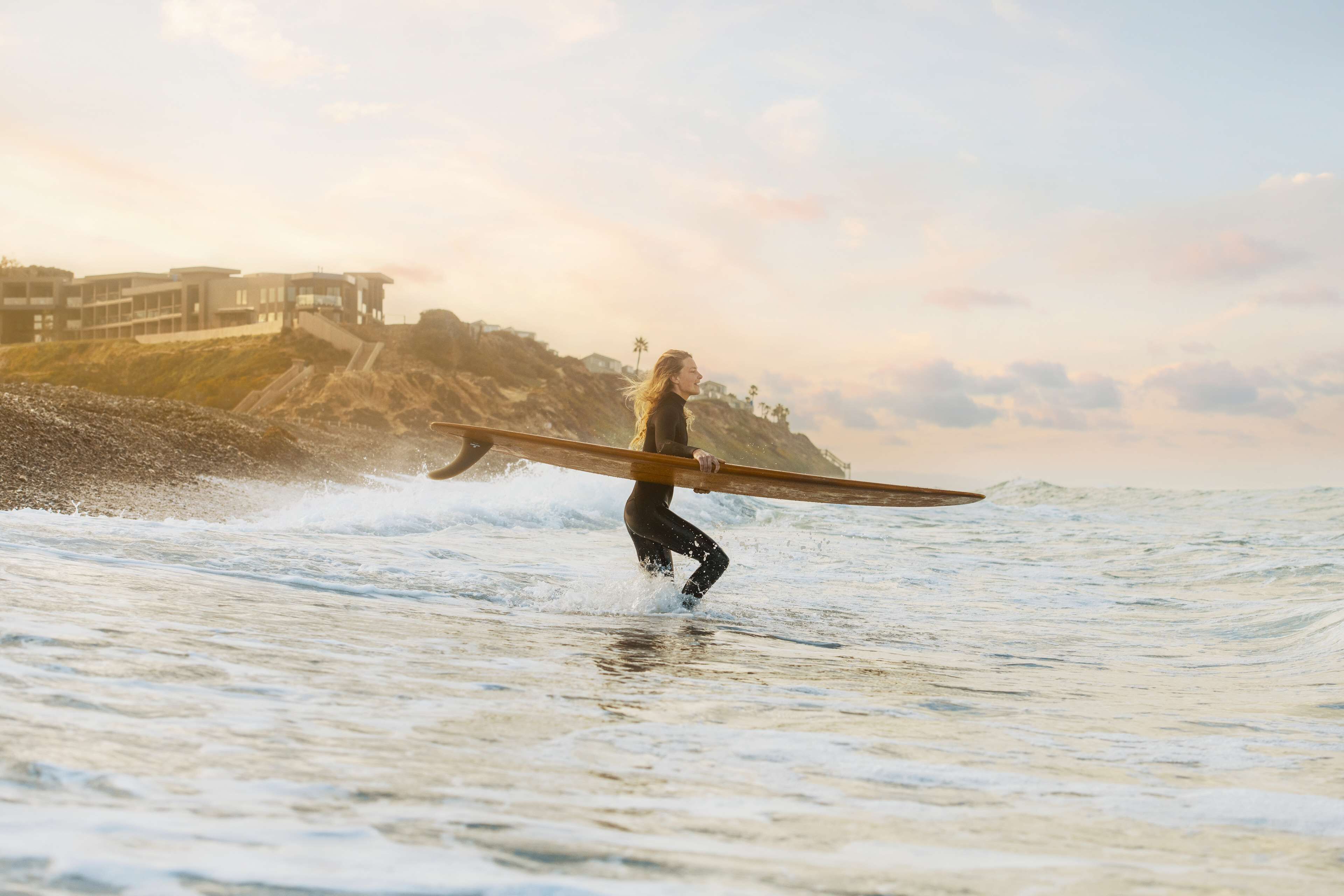 on the beach, sun-loungers, beach umbrellas, beach towels