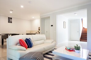 Smart TV, DVD player, table football, books